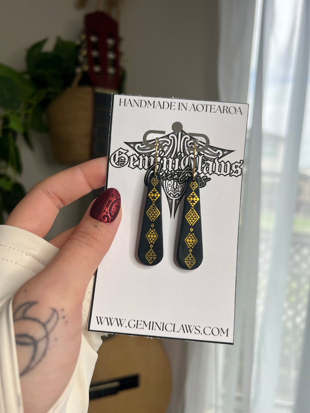 Matte Black Roimata Earrings – Gold Tāniko Design with Gold Hooks