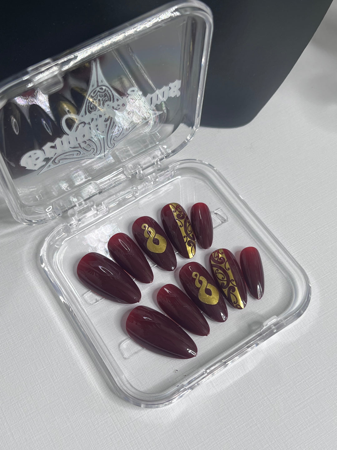 Medium Almond Maroon & Gold Nails