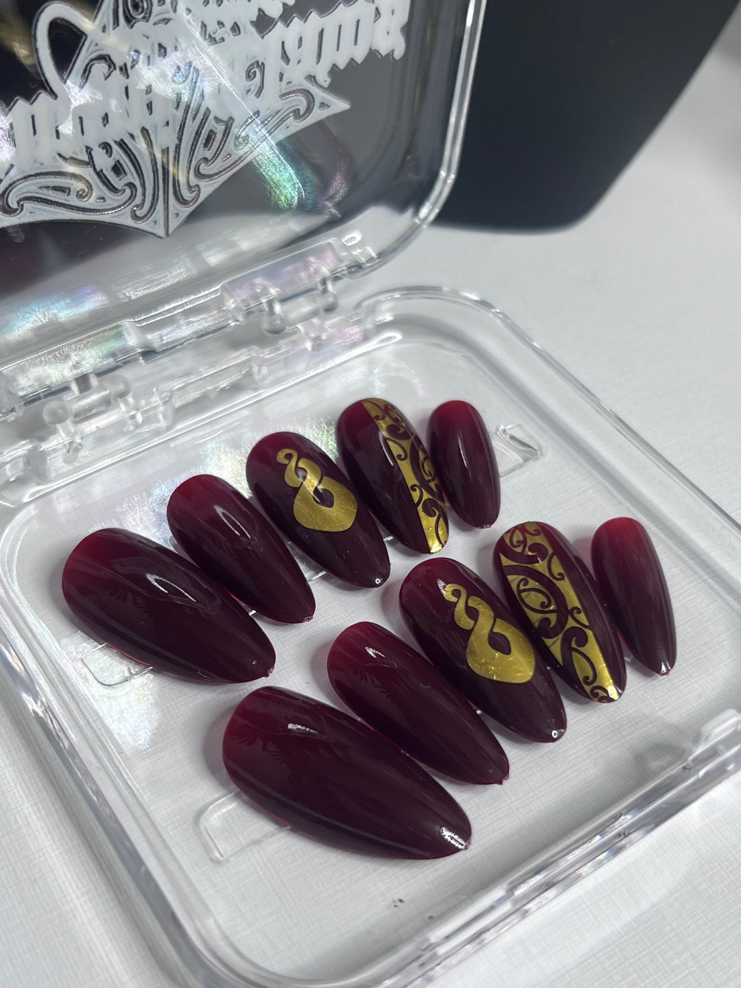 Medium Almond Maroon & Gold Nails