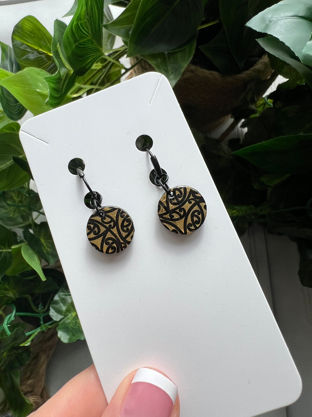 Black kowhaiwhai on gold | Short Earrings | Black huggies